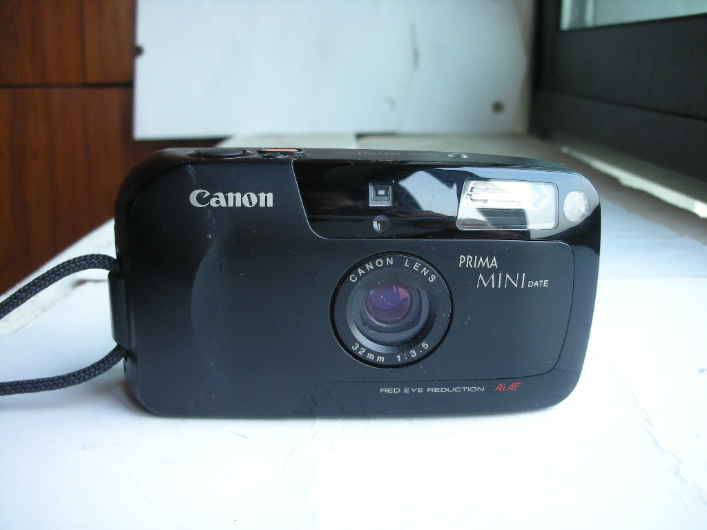 很新佳能mini32mmf3.5定焦镜头经典胶卷相机，送相机套，挂绳