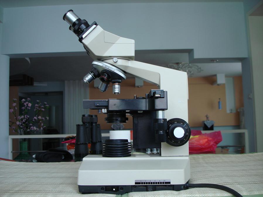 日本原产的奥林巴斯      高级电光双目显微镜,自带光
