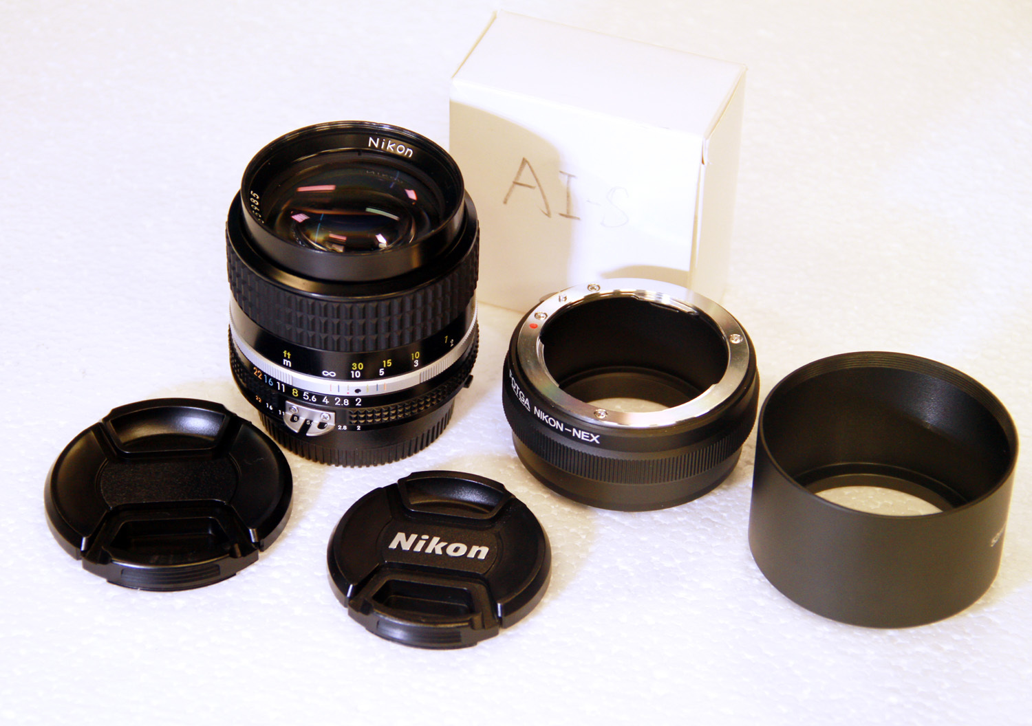  Nikon manual focusing AIS85 F2.0 sent to Sony E port adapter ring sent metal hood
