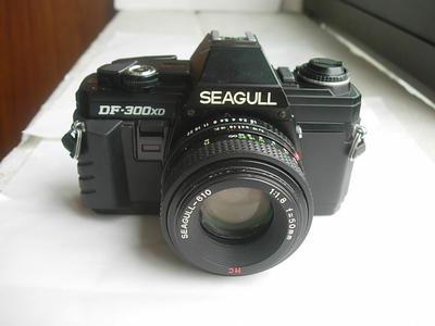很新海鸥DF300单反相机带50mmf1.8多膜镜头，收藏使用