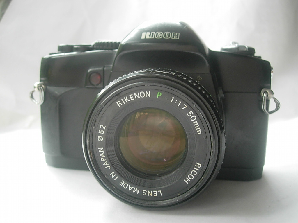 较新理光XR-7M2型单反相机，带50mmf1.7镜头，有多