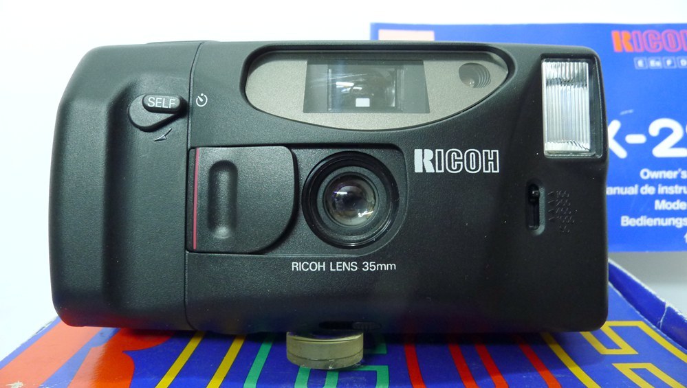 崭新理光LX-22焦距35MMF4.5定焦胶片傻瓜相机（说明拎带皮套全）