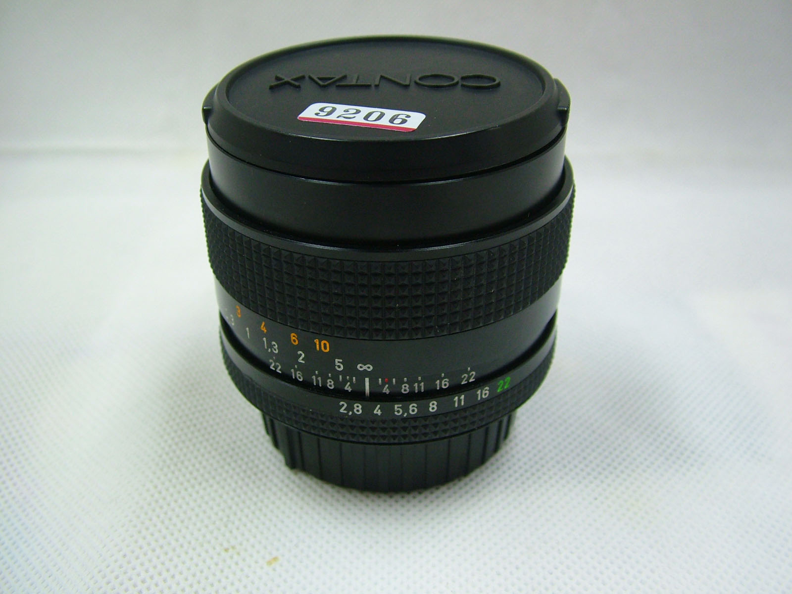   98 New CONTAIN 35/2.8MMJ has been changed to Nikon Port # 9206