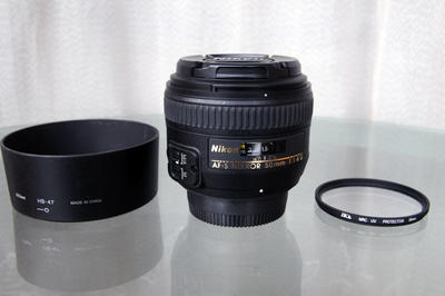 Nikon AFS 50/1.4G，带原厂遮光罩、德产UV