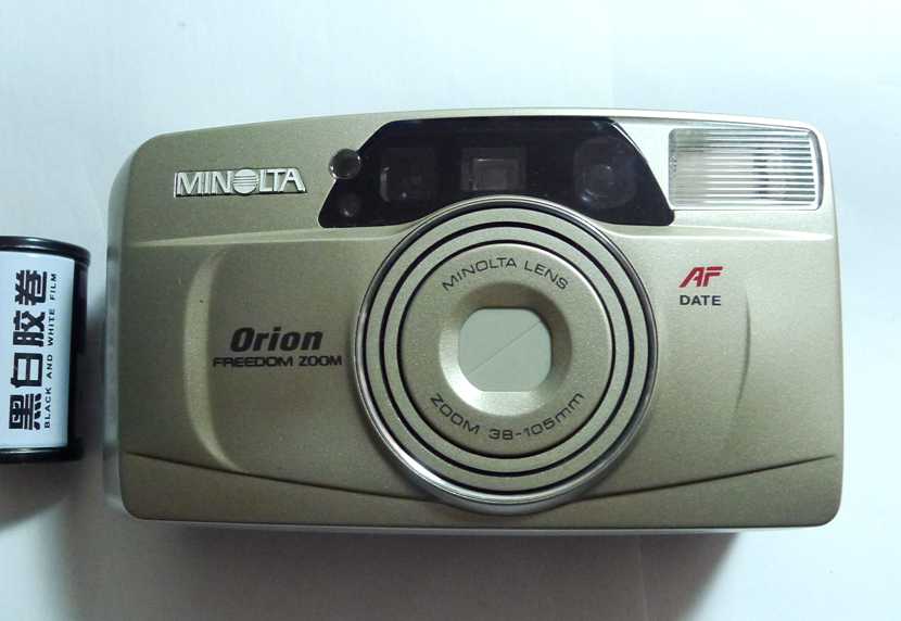 没装过胶卷的美能达AF38-105mm变焦自动傻瓜相机带自拍和防红眼功